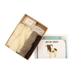 The contents of the The Makerss Jacob Sheep British Wool Needle Felt Kit, includes wool, felting needles, wool mats, and instruction booklet