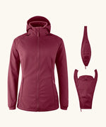 Mamalila soft shell baby wearing allrounder fitted jacket in burgundy next to the 2 inserts included with the jacket