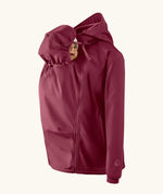 Mamalila soft shell baby wearing allrounder fitted jacket in burgundy showing a baby doll with the protective hood covering the head