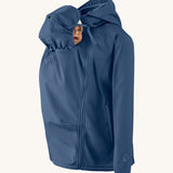 Mamalila soft shell baby wearing allrounder fitted jacket in navy available at Babipur with a baby doll demonstrating the forward sitting position with the protective hood covering the baby doll