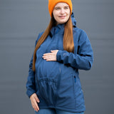 A mother wearing the Mamalila soft shell baby wearing allrounder fitted jacket in navy available at Babipur showing the fit of the jacket
