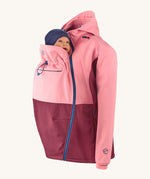 Mamalila soft shell baby wearing allrounder limited edition pro jacket in party purple available at Babipur with a baby doll demonstrating the forward sitting position with the protective hood down