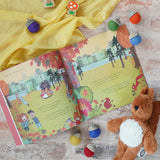 Marney's Mix Up by Jane Rushmore and Sally Darby, a children's autumnal book about squirrels collecting acorns, next to a Senger baby squirrel and Lanka Kade toadstools.