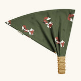 Maxomorra kids GOTS organic cotton bandana in green with a repeating cute fox print. Features a mustard yellow elasticated head band