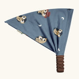 Maxomorra kids GOTS organic cotton bandana in light blue with a repeating cute owl print. Features a brown elasticated head band