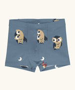 Maxomorra kids GOTS organic cotton boxer shorts in light blue with a repeating cartoon style owl print. Features an elasticated waist band