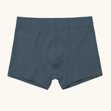 Maxomorra kids GOTS organic cotton boxer shorts in navy. Features an elasticated waist band
