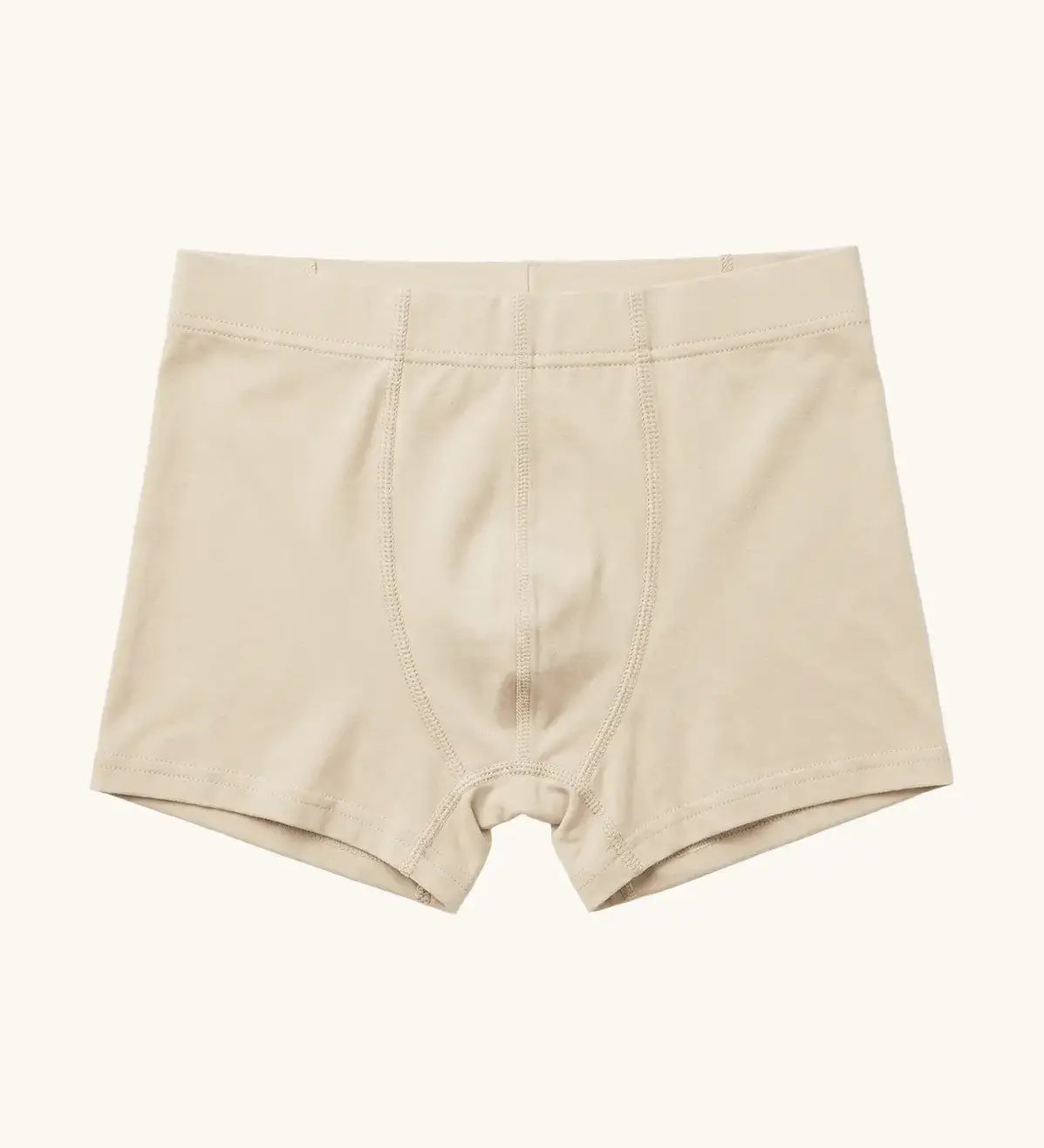 Maxomorra kids GOTS organic cotton boxer shorts in solid cream. Features an elasticated waist band