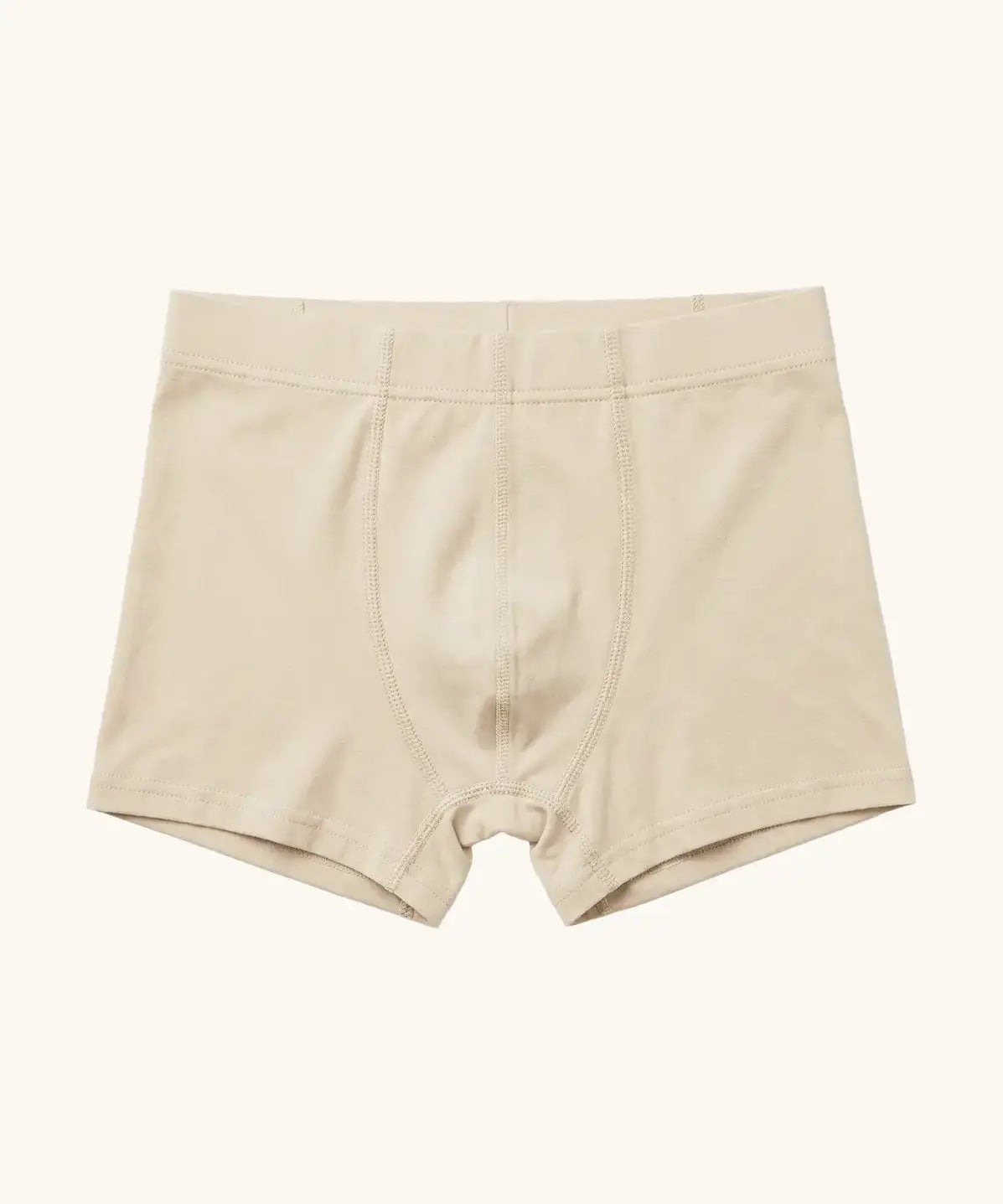 Maxomorra kids GOTS organic cotton boxer shorts in solid cream. Features an elasticated waist band