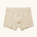 Maxomorra kids GOTS organic cotton boxer shorts in solid cream. Features an elasticated waist band