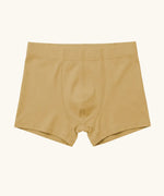 Maxomorra kids GOTS organic cotton boxer shorts in mustard yellow. Features an elasticated waist band