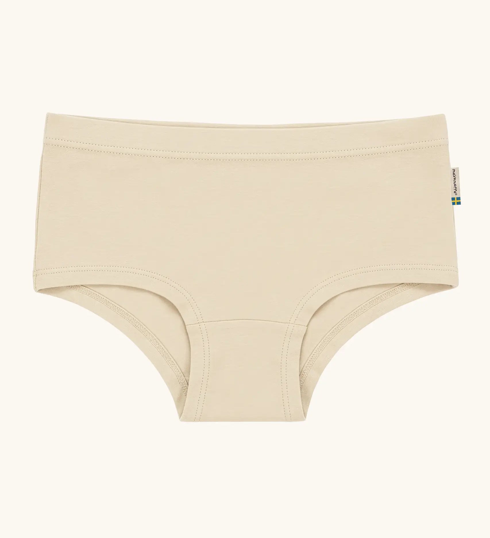 Maxomorra kids GOTS organic cotton brief hipster pants in solid cream. Features an elasticated waist band