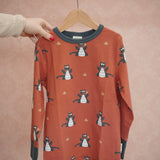 Maxomorra long sleeve kids top with dragon print in red with blue cuffs and piping, made from organic cotton.