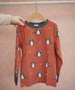 Maxomorra long sleeve kids top with dragon print in red with blue cuffs and piping, made from organic cotton.