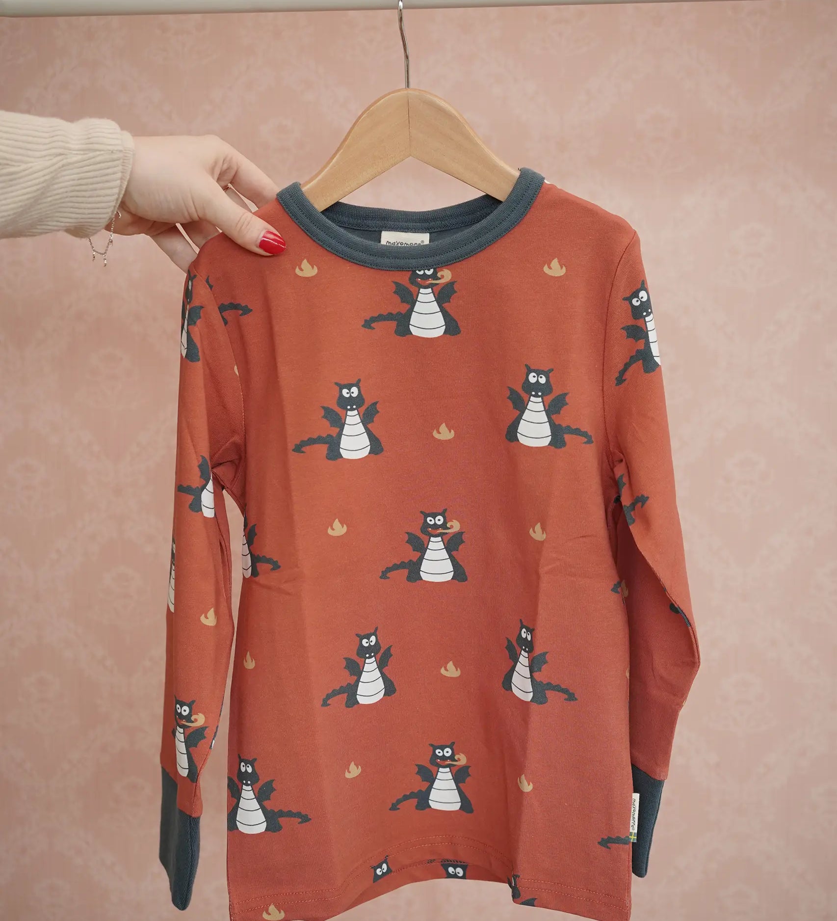 Maxomorra long sleeve kids top with dragon print in red with blue cuffs and piping, made from organic cotton.