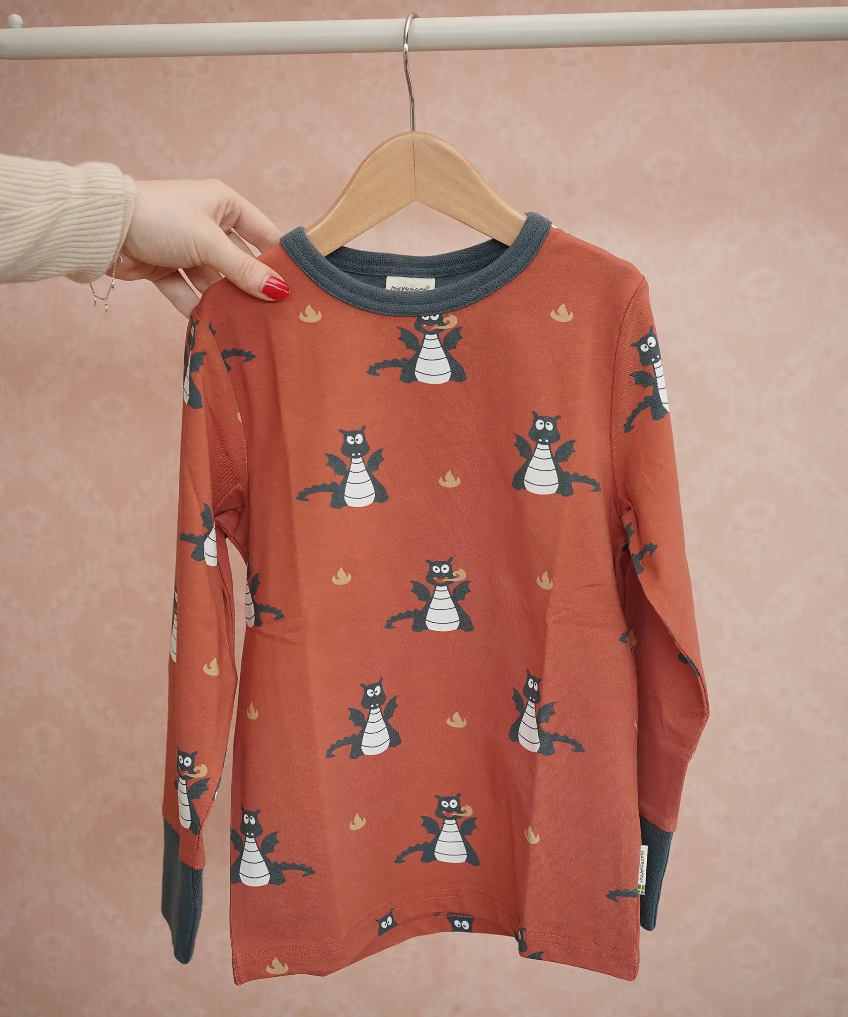 Maxomorra long sleeve kids top with dragon print in red with blue cuffs and piping, made from organic cotton.