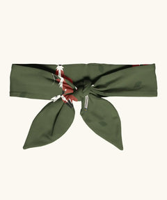 Maxomorra kids GOTS organic cotton hairband in green with a repeating cute fox print. Hairband is in a knot tie style 