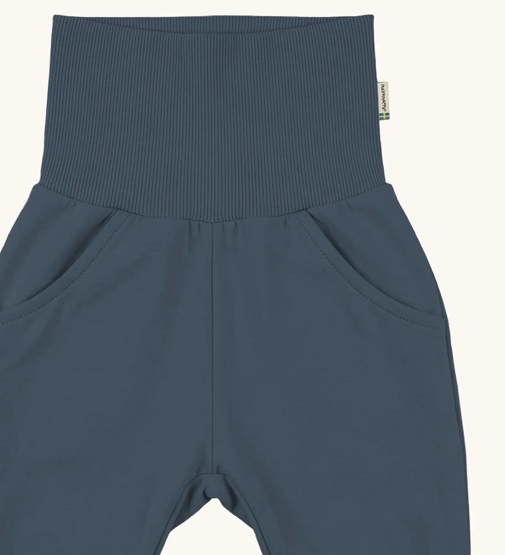 Maxomorra kids elasticated waist pants with pockets in blue, made from GOTS organic cotton.