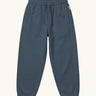 Maxomorra kids baggy sweat pants in navy, features a drawstring cord around the waist and side pockets