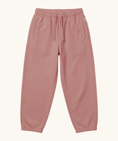 Maxomorra kids baggy sweat pants in solid pink, features a drawstring cord around the waist and side pockets