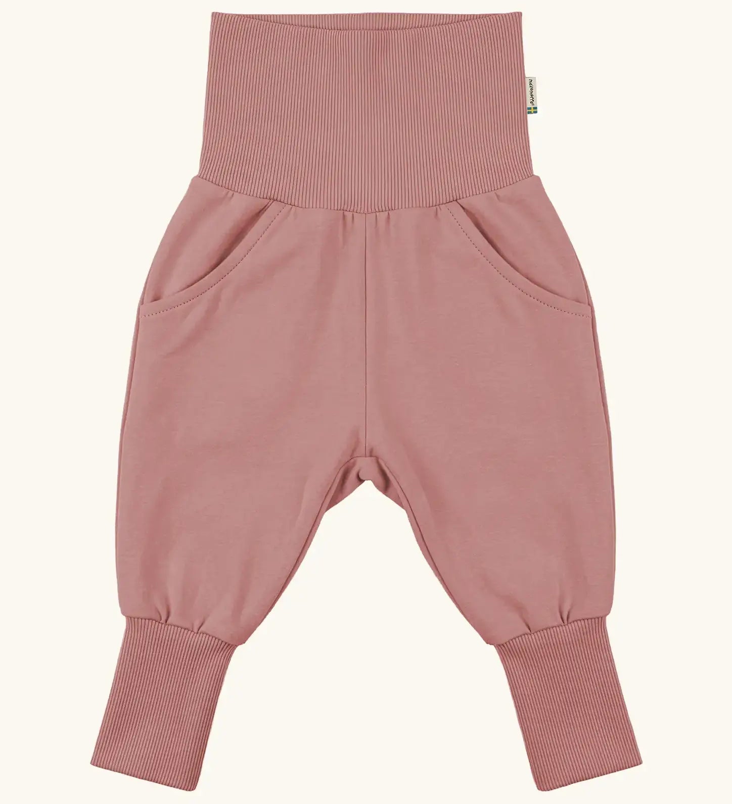 Maxomorra GOTS organic cotton waist sweat pants in solid pink. Features a elasticated waist band leg cuffs and side pockets