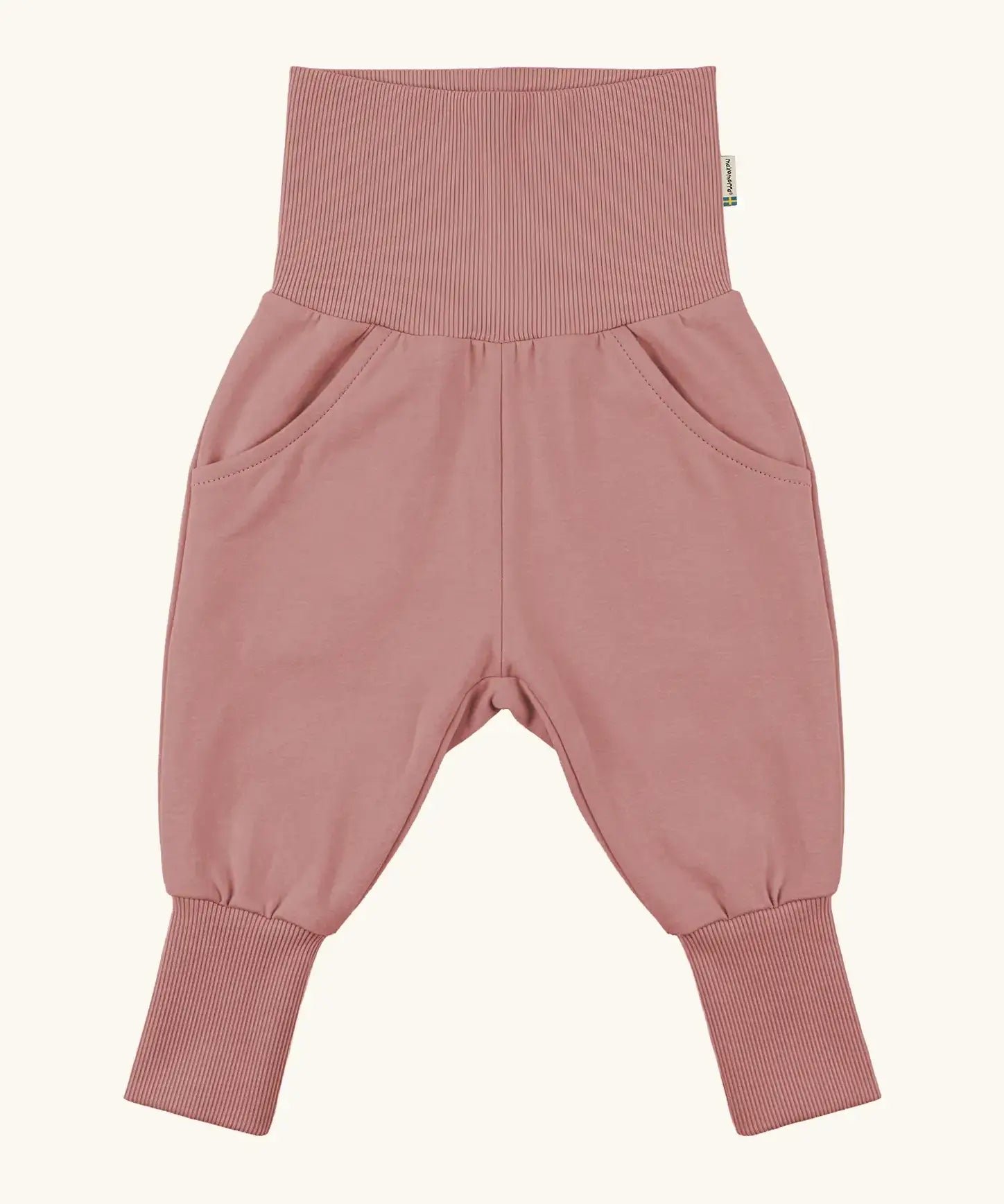 Maxomorra GOTS organic cotton waist sweat pants in solid pink. Features a elasticated waist band leg cuffs and side pockets