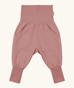 Maxomorra GOTS organic cotton waist sweat pants in solid pink. Features a elasticated waist band leg cuffs and side pockets
