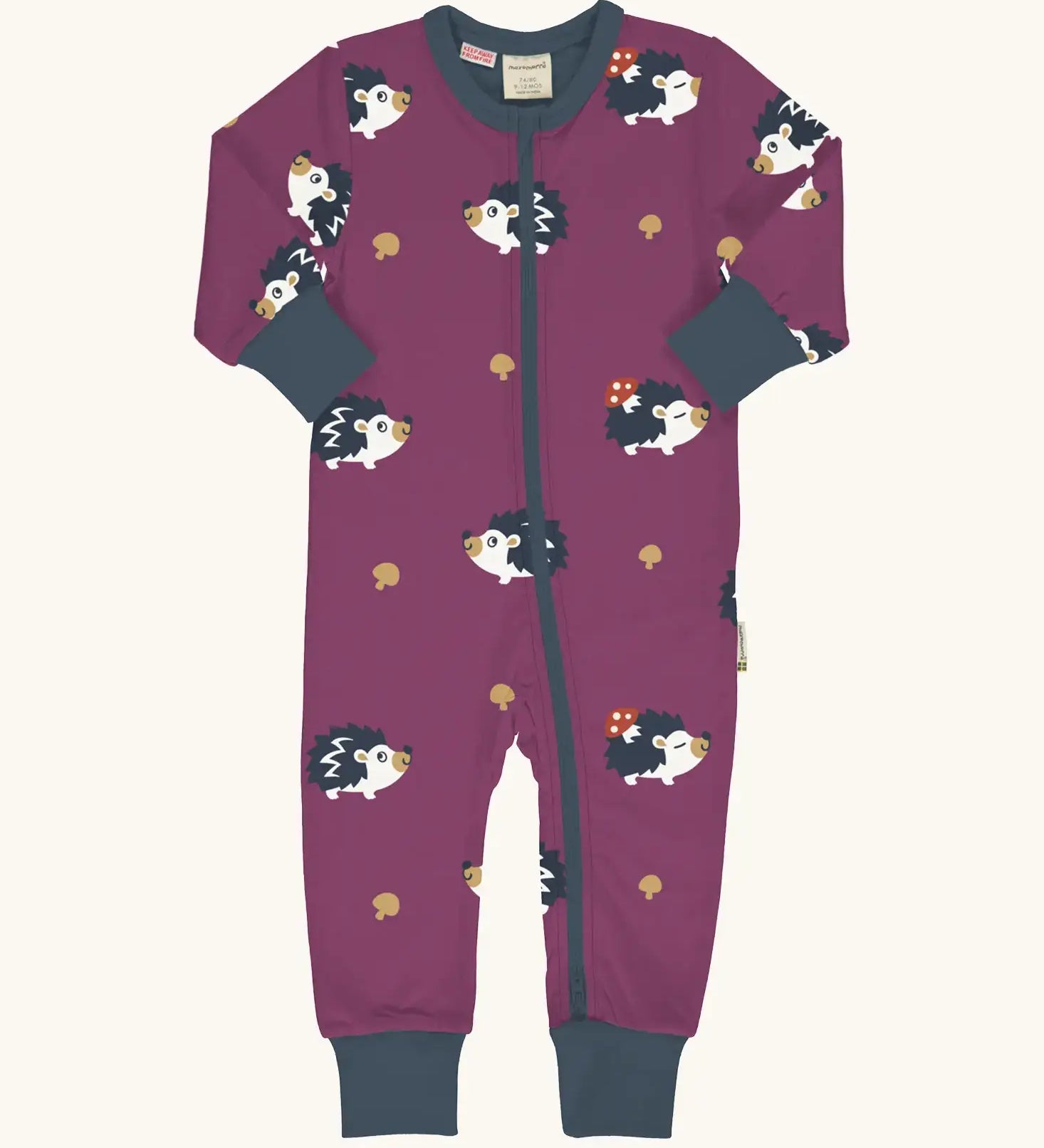 Maxomorra GOTS organic cotton baby long sleeve rompersuit in purple with a cute repeating hedgehog print, navy neck, cuffs and full front zip fastener