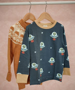 Maxomorra long sleeve kids top with ufo print in blue with yellow cuffs and piping and Little Green Radicals yellow wool jumper.