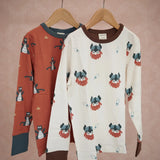 Maxomorra long sleeve kids tops, Viking in white and dragon in red, both made from organic cotton.