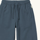Maxomorra kids joggers with elasticated waistband and pockets in blue, made from GOTS organic cotton.