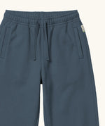 Maxomorra kids joggers with elasticated waistband and pockets in blue, made from GOTS organic cotton.