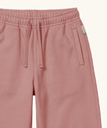 Maxomorra kids joggers with elasticated waistband and pockets in pink, made from GOTS organic cotton.