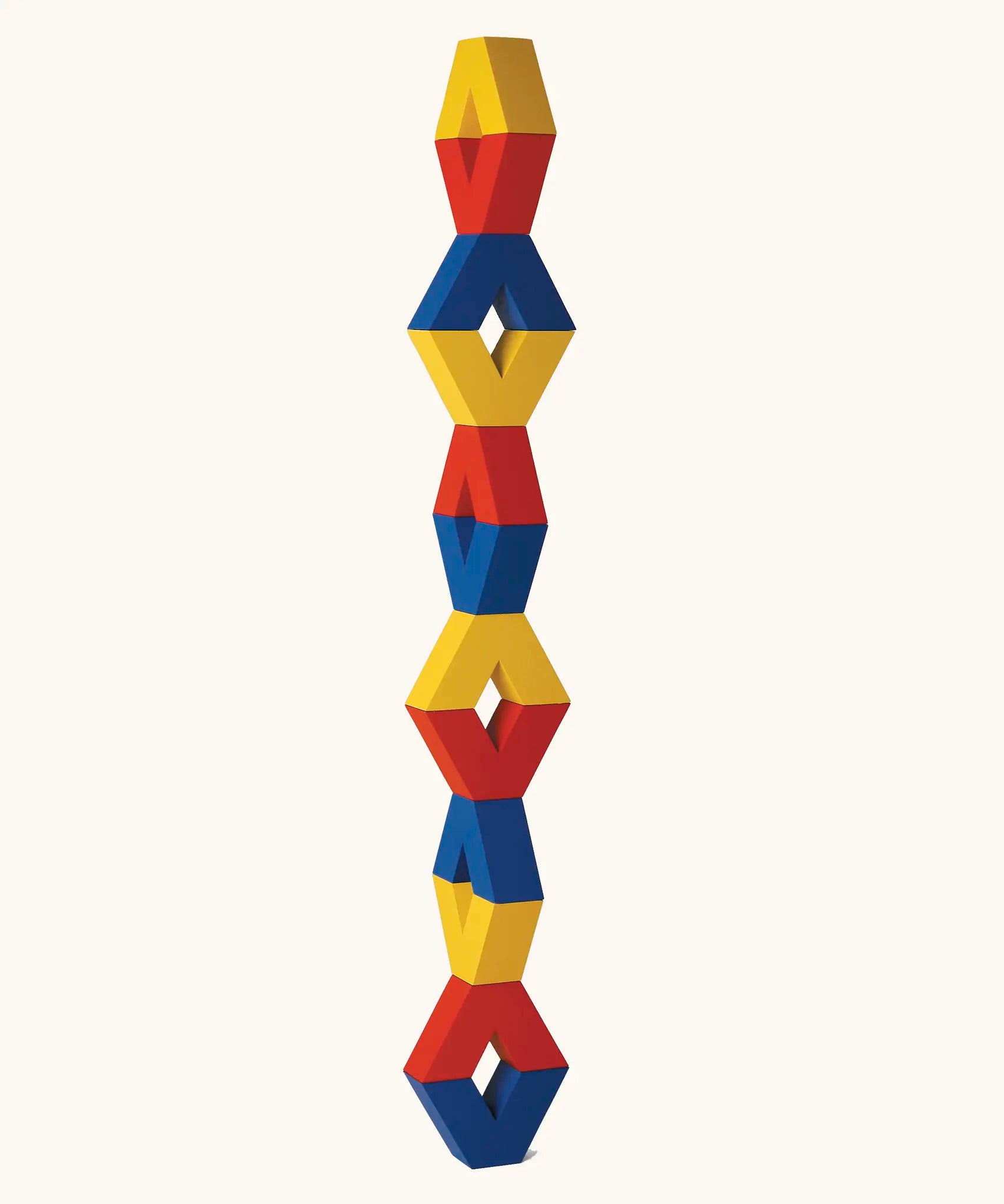Naef Vivo, a set of V-shaped wooden pieces in yellow, blue and red by Japanese toy designer Yasuo Aizawa, designed for open-ended construction and creative play.