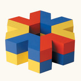 Naef Vivo, V shaped wooden pieces in yellow, blue and red, a construction toy designed by Japanese toy designer Yasuo Aizawa.