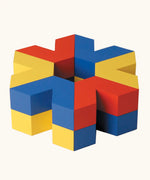 Naef Vivo, V shaped wooden pieces in yellow, blue and red, a construction toy designed by Japanese toy designer Yasuo Aizawa.