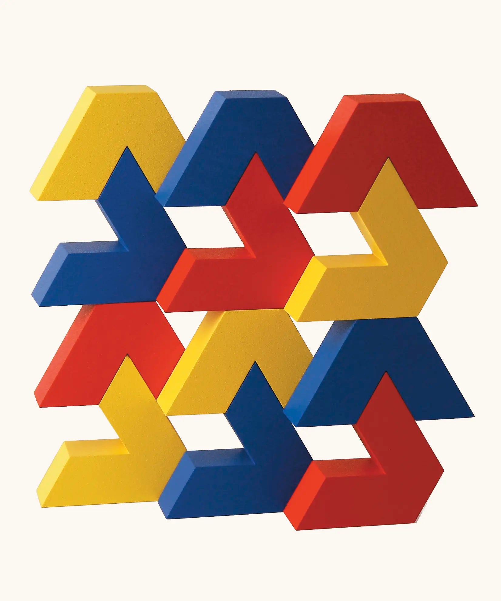 Naef Vivo, a sleek construction toy made up of V-shaped wooden pieces in yellow, blue and red, created by renowned Japanese toy designer Yasuo Aizawa.