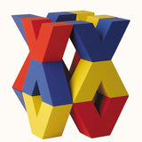 Naef Vivo, a colourful construction toy featuring V-shaped wooden pieces in yellow, blue and red, designed by Japanese toy designer Yasuo Aizawa.