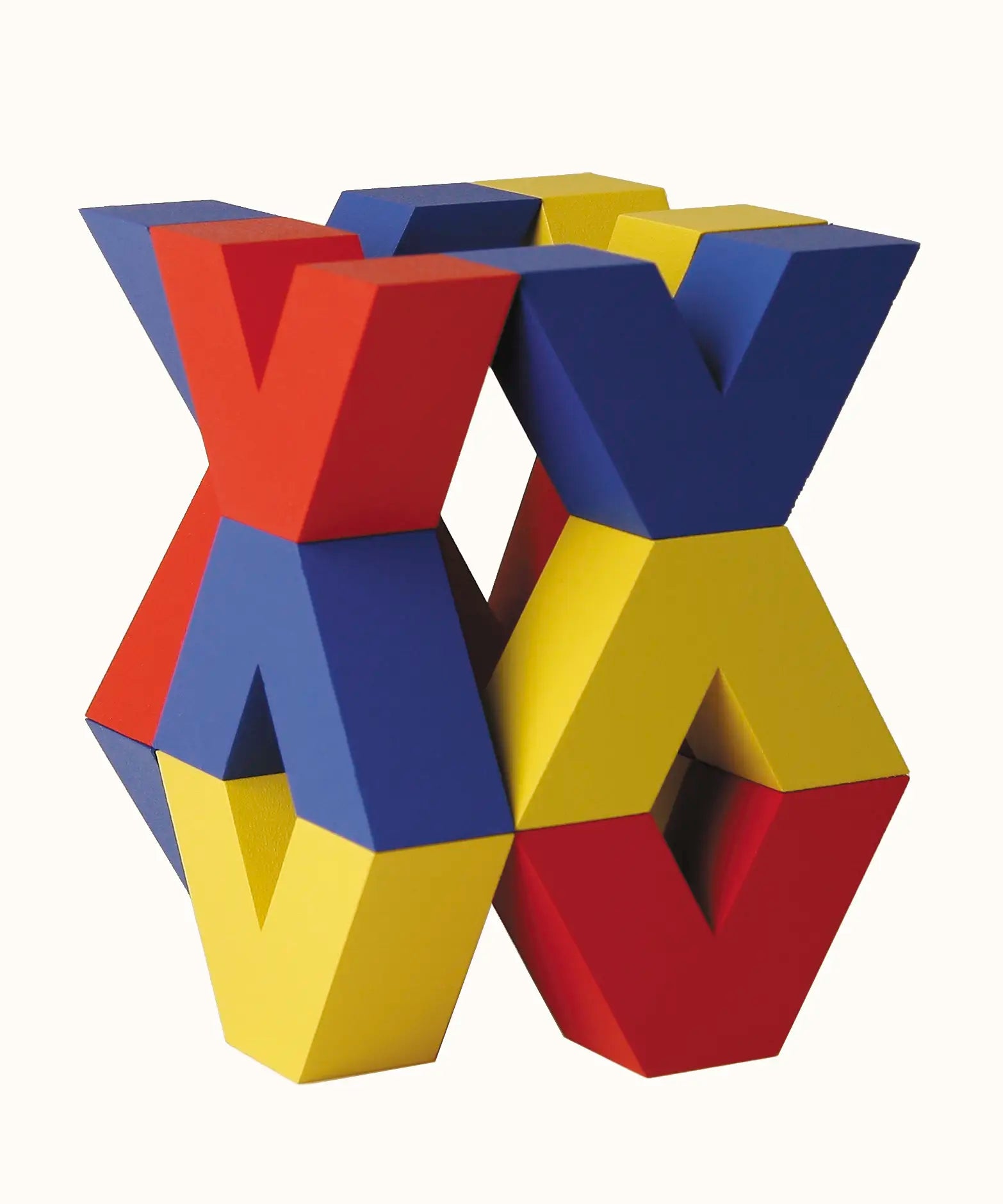 Naef Vivo, a colourful construction toy featuring V-shaped wooden pieces in yellow, blue and red, designed by Japanese toy designer Yasuo Aizawa.