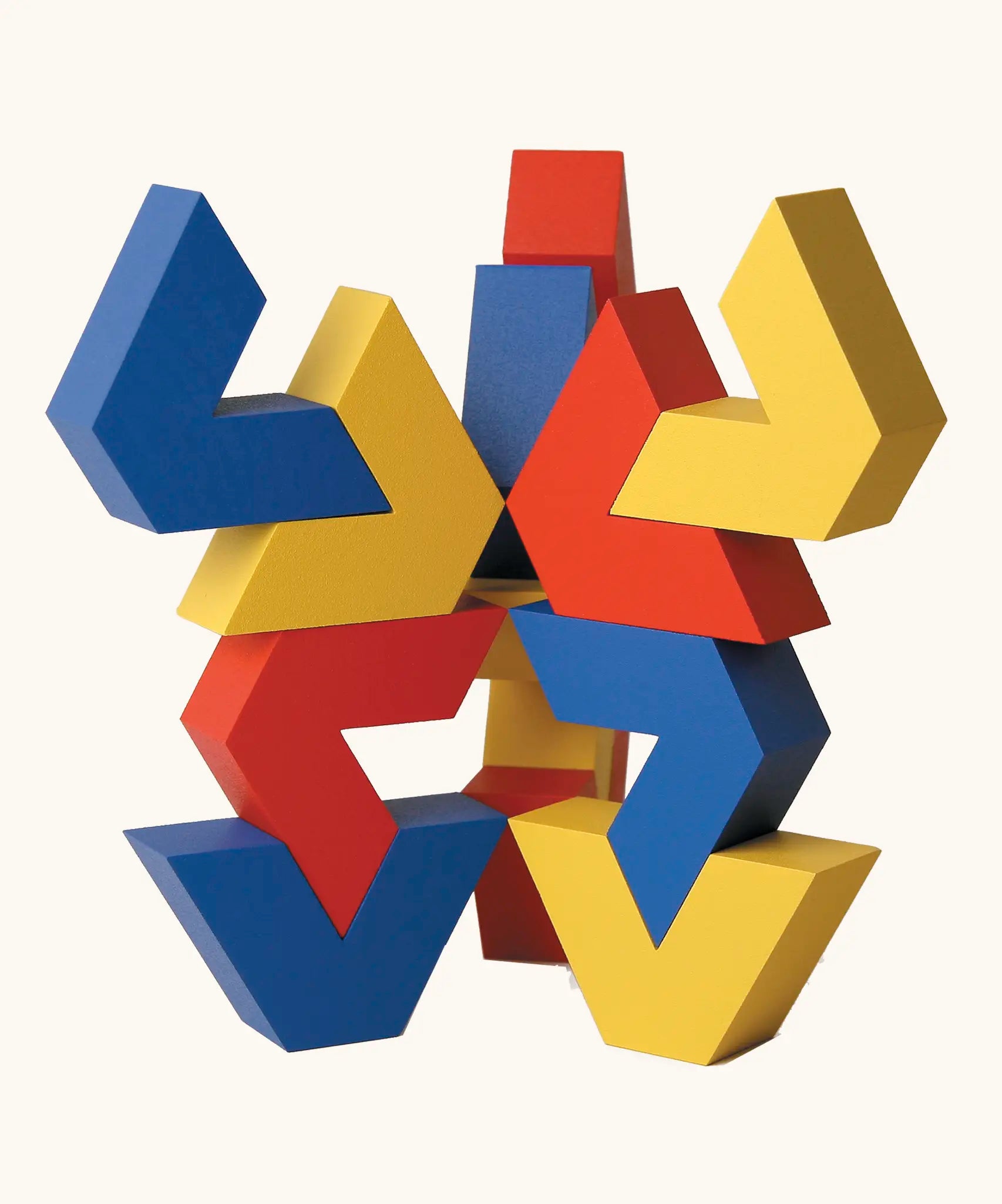 Naef Vivo toy, stackable V shaped wooden pieces in yellow, blue and red, designed by Japanese toy designer Yasuo Aizawa.