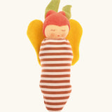 Nanchen soft butterfly doll tucked up in a brown striped blanket acting as a cocoon 