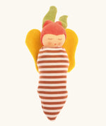 Nanchen soft butterfly doll tucked up in a brown striped blanket acting as a cocoon 