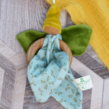 Nanchen flower fairy, crafted from organic cotton with wooden ring, green velour wings, yellow pointed hat, and hanging loop, buy now at Babipur.