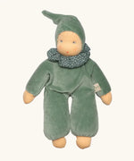 Nanchen nani soft doll in mint green with a waldorf style face. Showing a green with white frilled scarf and hat