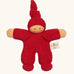 Nanchel pimpel waldorf doll in cherry red. Showing cute facial features and a tie on the hat. Doll has a terry cloth body 