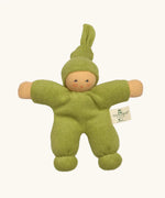 Nanchel pimpel waldorf doll in green. Showing cute facial features and a tie on the hat. Doll has a terry cloth body 