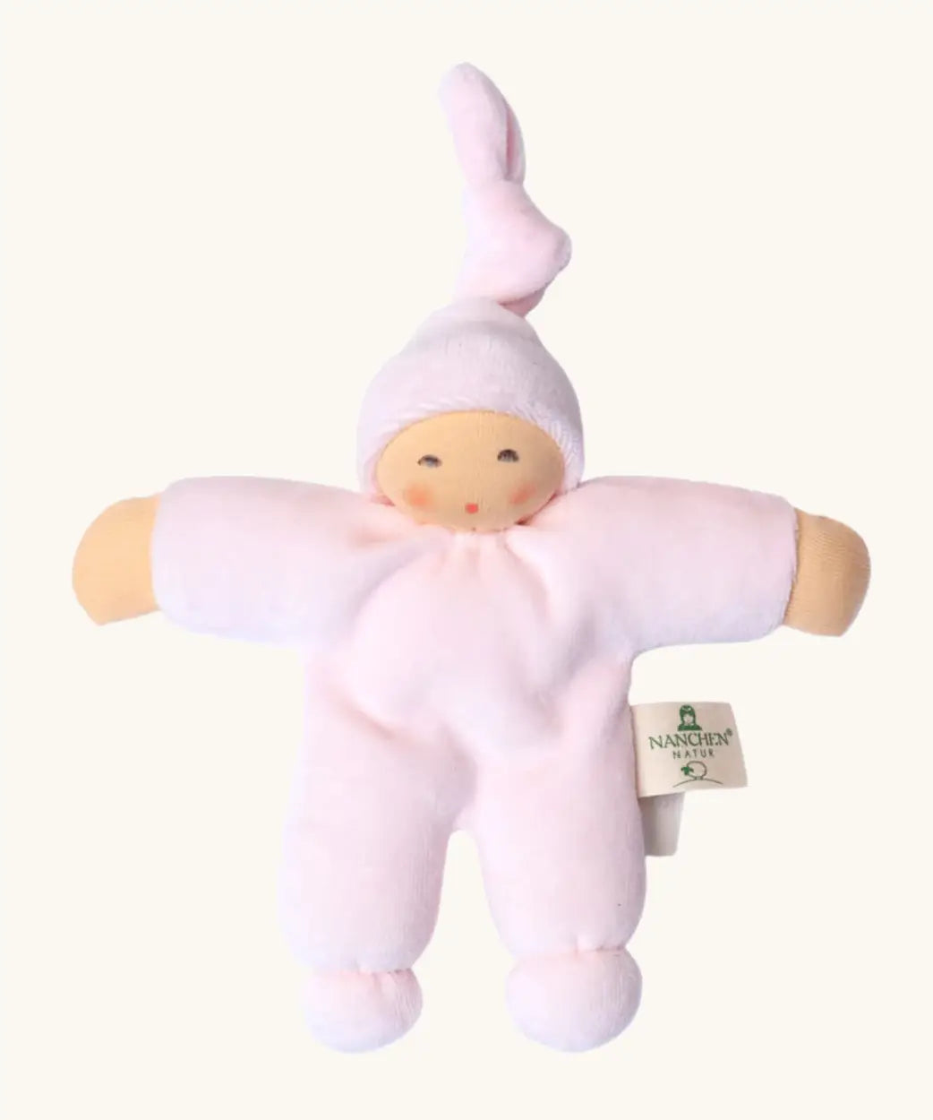 Nanchel pimpel waldorf doll in pastel pink. Showing cute facial features and a tie on the hat. Doll has a terry cloth body 