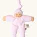 Nanchel pimpel waldorf doll in pastel pink. Showing cute facial features and a tie on the hat. Doll has a terry cloth body 