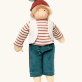 Nanchen chestnut child Paul doll with a waldorf style face. Showing removable white waistcoat, stripy top and blue trousers and chestnut hat