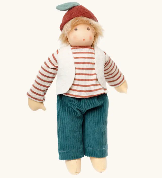 Nanchen chestnut child Paul doll with a waldorf style face. Showing removable white waistcoat, stripy top and blue trousers and chestnut hat